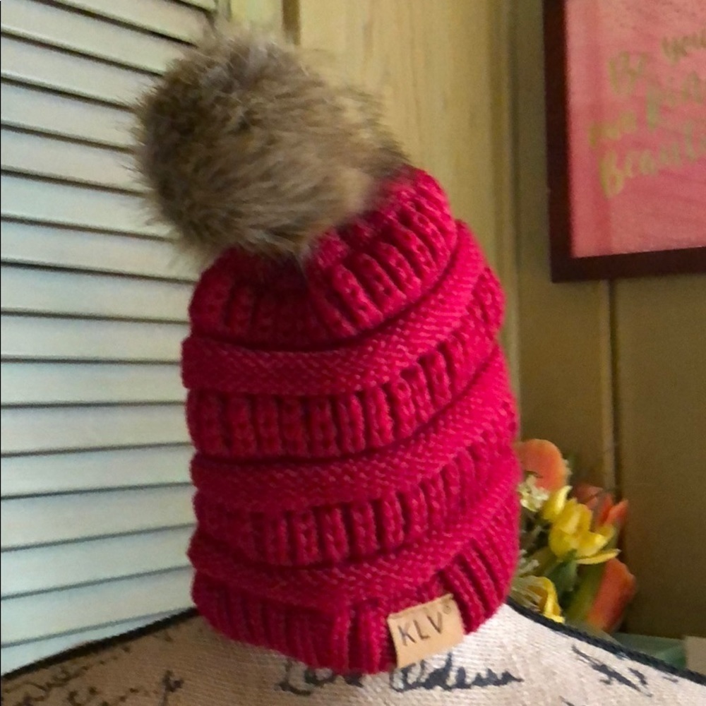Red knit cap with furry topper